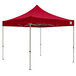 A red Caravan Canopy Displayshade tent with white poles.