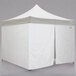 A white Caravan Canopy tent with two doors open.