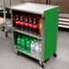 A Lakeside metal utility cart with a green laminate finish and bottles of soda and water on it.