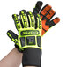 A pair of lime green and black Cordova heavy duty work gloves with orange and black accents on a white background.