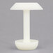 A white plastic Matfer Bourgeat double-sided molding stamp.