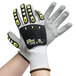 A pair of Cordova OGRE-CR gloves with gray palm coating and TPR reinforcements.
