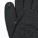 A medium gray Cordova Conquest Xtreme glove with black foam nitrile full coating and nitrile dots, shown with holes in the palm.