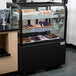 Avantco BCD-36 36" Curved Glass Black Dry Bakery Display Case Main Thumbnail 1