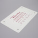 A white San Jamar cutting board mat with red text.