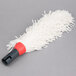 A white mop with a red handle.