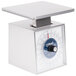An Edlund stainless steel portion scale on a counter.