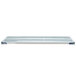 A white MetroMax metal shelf with blue accents.