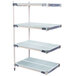 A MetroMax i 4-Shelf Add-On Kit with 3 shelves with white polymer shelves and metal poles.