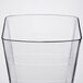 A clear plastic Fineline Wavetrends tumbler with black lines.