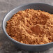 A bowl of brown Regal Pumpkin Pie Spice powder.