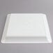 A white square Fineline Platter Pleaser with a circular pattern on top.