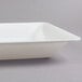 A white rectangular Fineline Platter Pleaser with a lid.