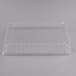 A clear plastic Fineline rectangular dome lid on a clear plastic container.