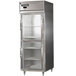 A stainless steel Continental reach-in refrigerator with glass doors and shelves.