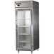 A large stainless steel Continental reach-in refrigerator with half glass doors.