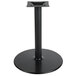 A BFM Seating black stamped steel table base with a round column and base.