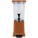 A brown plastic Choice beverage dispenser with a black handle.