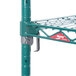 A Metroseal wire rack with green shelves and metal hooks.