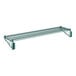 A Regency green epoxy wire wall mount shelf with two supports holding green metal shelves.
