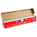 A red box with white accents containing SC Johnson Saran Premium Plastic Wrap.