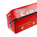 A red box of SC Johnson Saran™ Premium Plastic Wrap with a label on a white background.