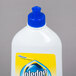 A white SC Johnson Pledge Squirt and Mop floor care cleaner bottle with a blue cap.