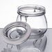 A Choice glass storage jar with a metal hinge lid.