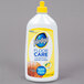 A white SC Johnson Pledge floor care cleaner bottle with a yellow label and cap.