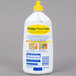 A white bottle of SC Johnson Pledge Squirt and Mop Hardwood Floor Care Cleaner with yellow and blue text.