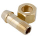 A brass threaded nut and a gold nut.