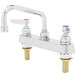 A silver T&S deck-mounted workboard faucet with two lever handles.