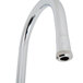 A T&S chrome deck-mounted faucet with white lever handles.