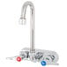 A T&S chrome wall mount faucet with lever handles.