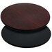 A close-up of a Flash Furniture round black and mahogany reversible table top.