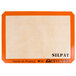 A white Sasa Demarle quarter size Silpat baking mat with orange trim.