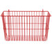A Metro flame red wire storage basket with a handle.