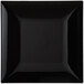 A black square Tabletop Classics charger plate with a white border.