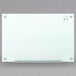 A Quartet frameless white glass markerboard with metal handles.