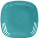 A blue square Fiesta® luncheon plate with a white center.