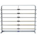 A gray metal rack with metal shelves holding paper rolls.