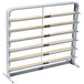 A gray metal rack with six wooden shelves for paper cutters.