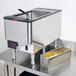 A Nemco electric pasta cooker on a table in a commercial kitchen.