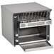 A silver Vollrath conveyor toaster with the door open on a counter.