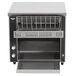 A black and silver Vollrath conveyor toaster with a rack on top.