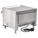 A stainless steel Vollrath conveyor toaster with a cord and wire plugged in.