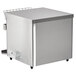 A silver square Vollrath conveyor toaster with a wire rack inside.