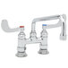 A white T&S deck-mounted pantry faucet with two wrist handles and a swing nozzle.