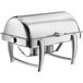 An Acopa stainless steel roll top chafer with a lid.