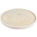 A round bamboo steamer cover with a woven pattern.